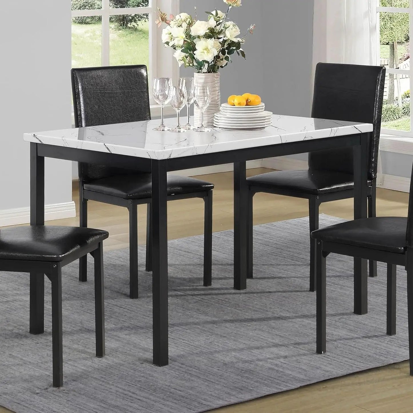 Noyes Metal Dining Table With Laminated Faux Marble Top 45 Inch Off White from PriceLows™