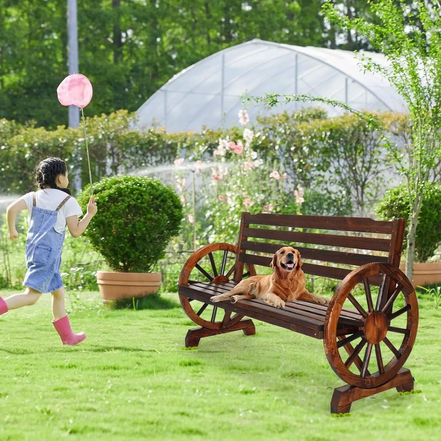 Rustic Wooden Garden Bench with Wagon Wheel Arms from PriceLows™
