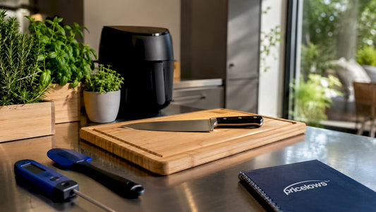 Essential kitchen gadgets on countertop with logo