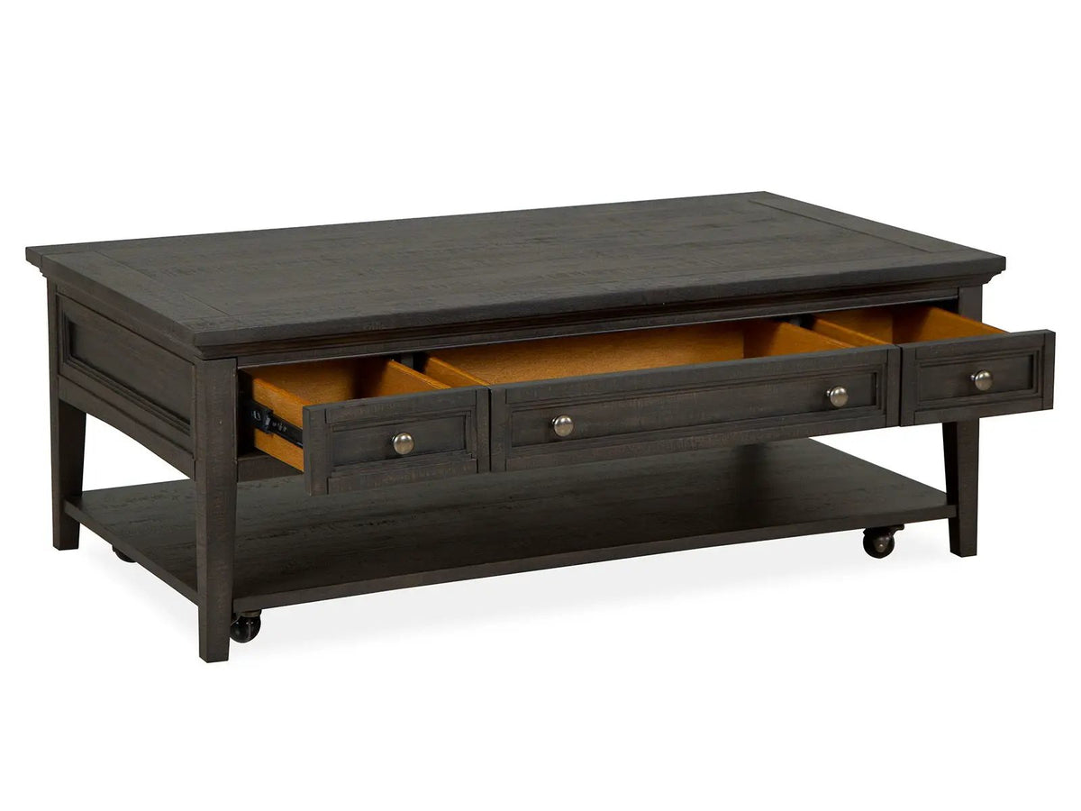 Westley Falls Rectangular Cocktail Table | Graphite | Three Storage Drawers | Casters