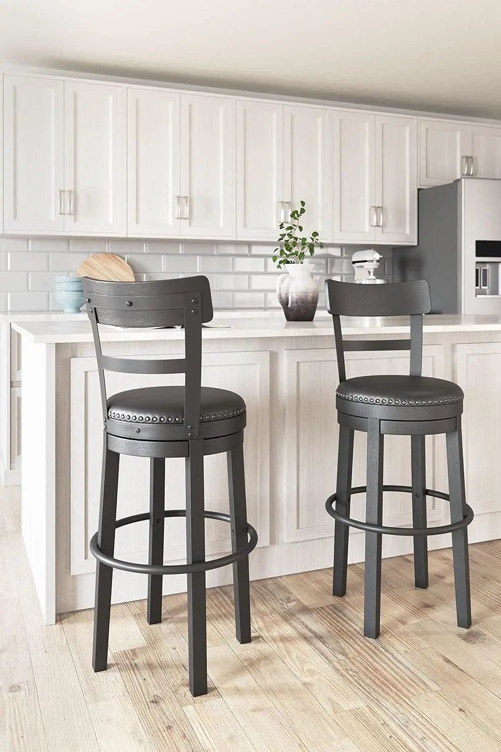 Valebeck 30.38 Black Upholstered Pub Height Swivel Barstool from PriceLows™