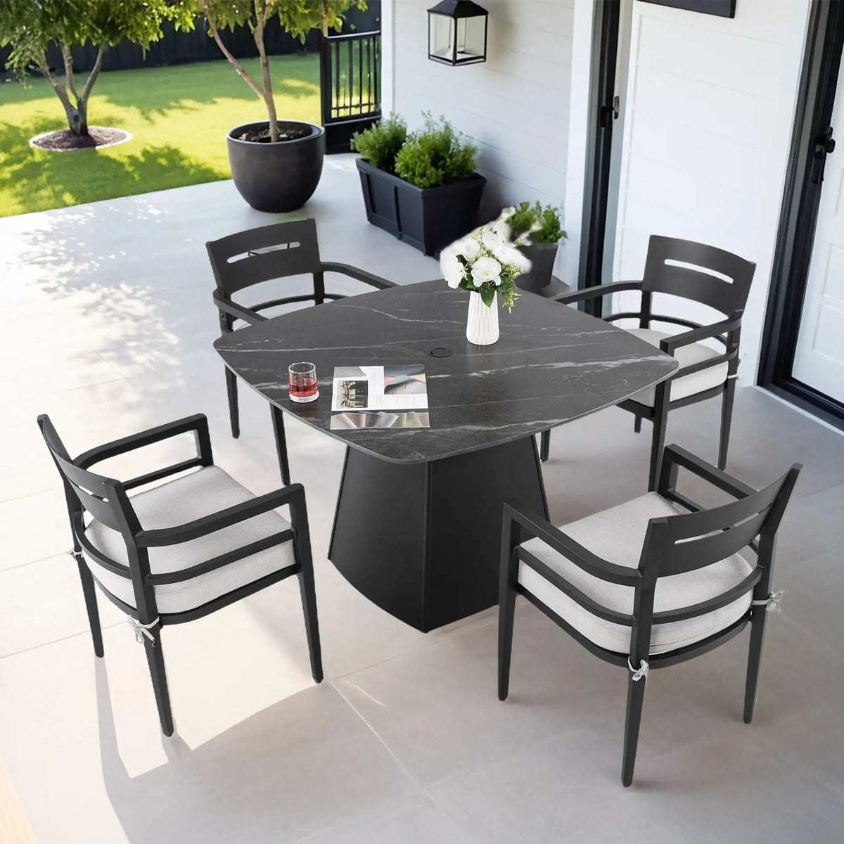 Outdoor Patio Dining Set | Squircle Sintered Stone Table | Sunbrella Cushion Chairs | Rust-Free Aluminum Frame