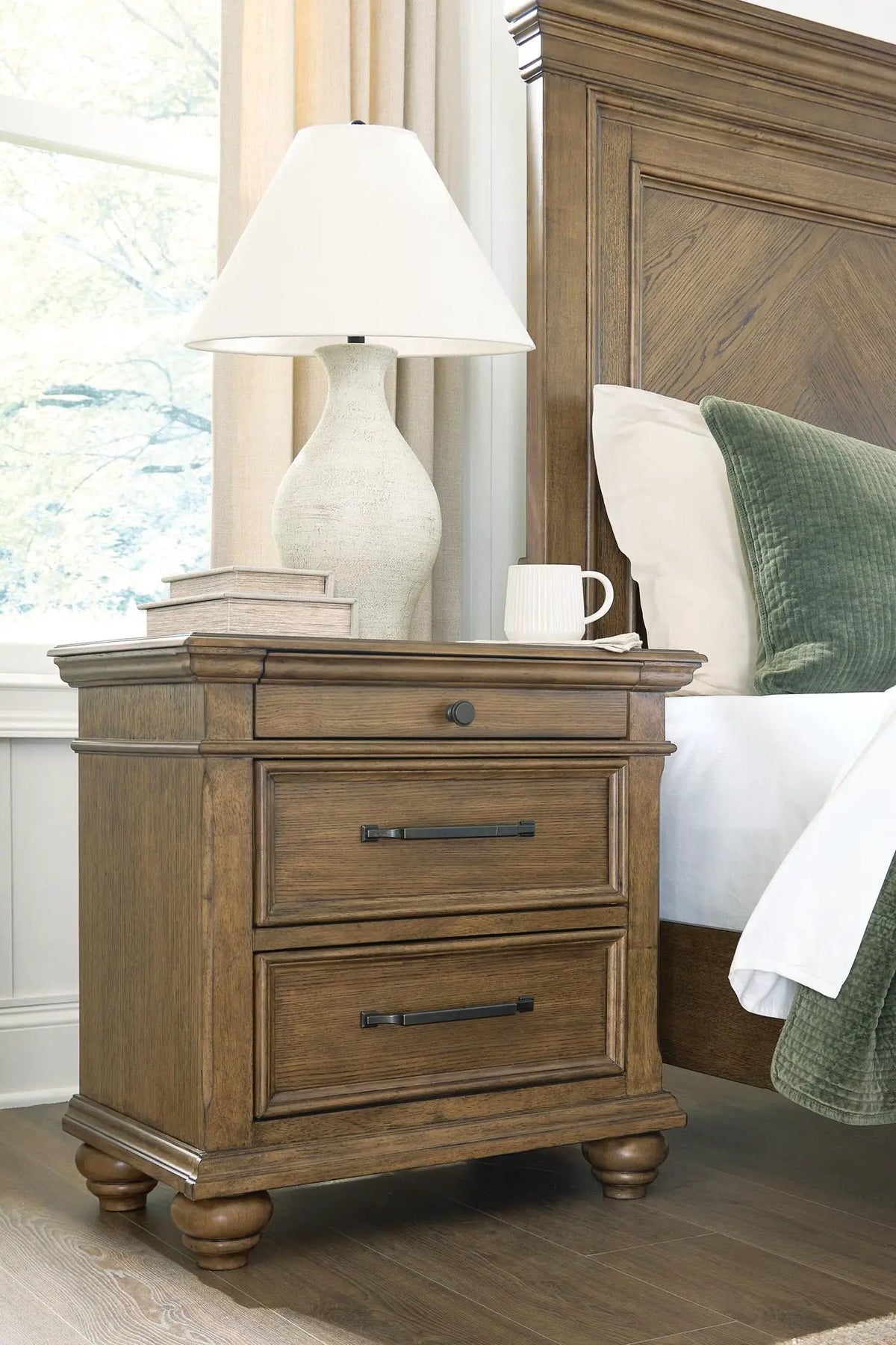 Karallin Three Drawer Nightstand | Medium Brown Finish | Oak Veneer | Lined Top Drawer