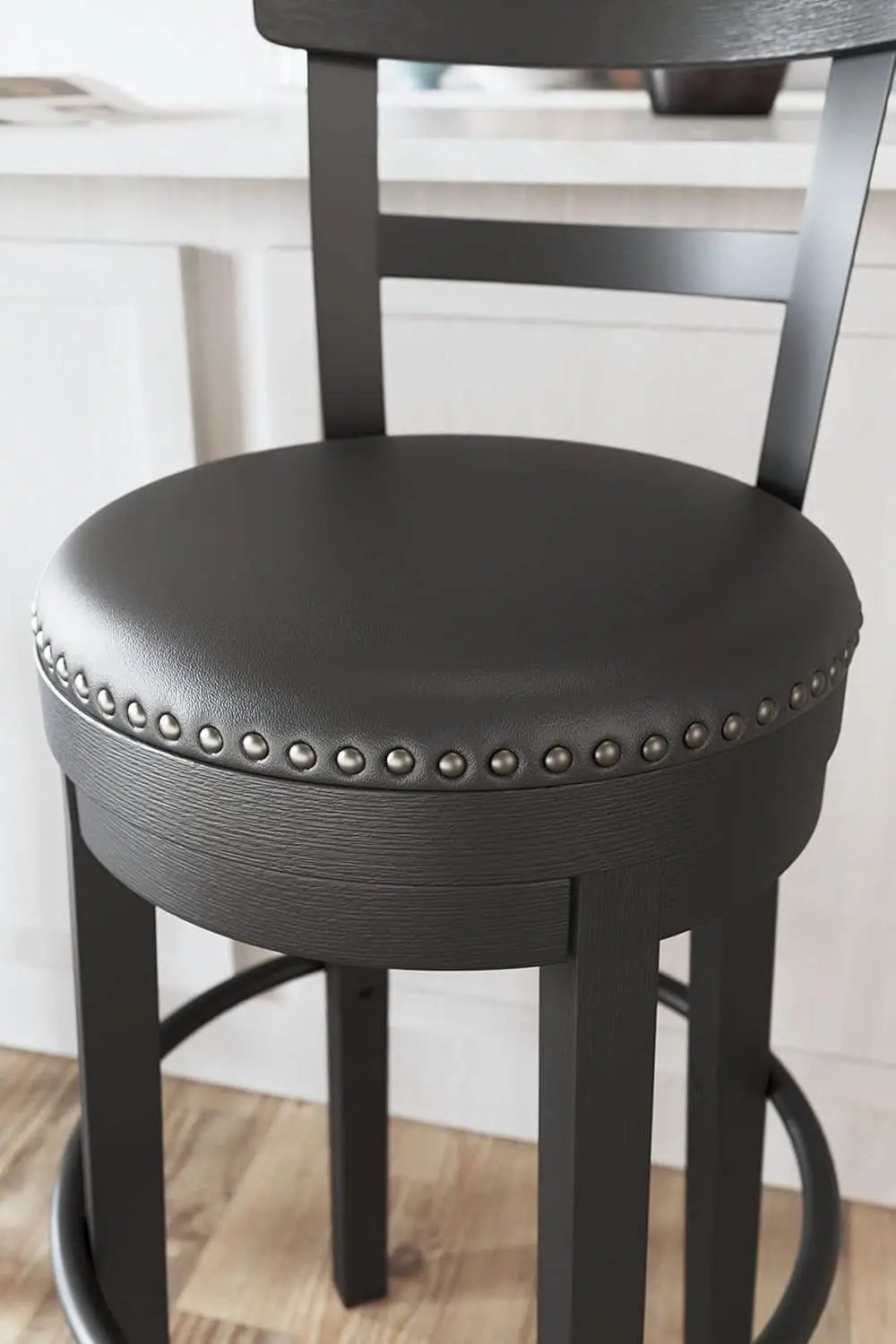 Valebeck 30.38 Black Upholstered Pub Height Swivel Barstool from PriceLows™