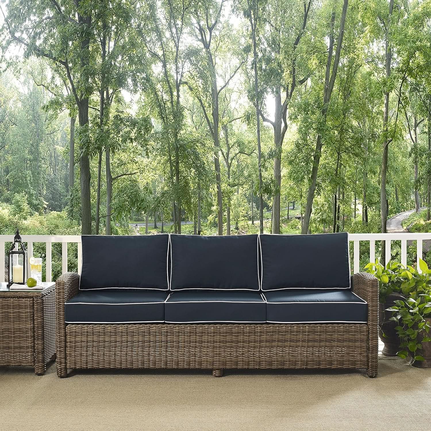Brown Wicker Outdoor Sofa with Navy Cushions for Comfort from PriceLows™