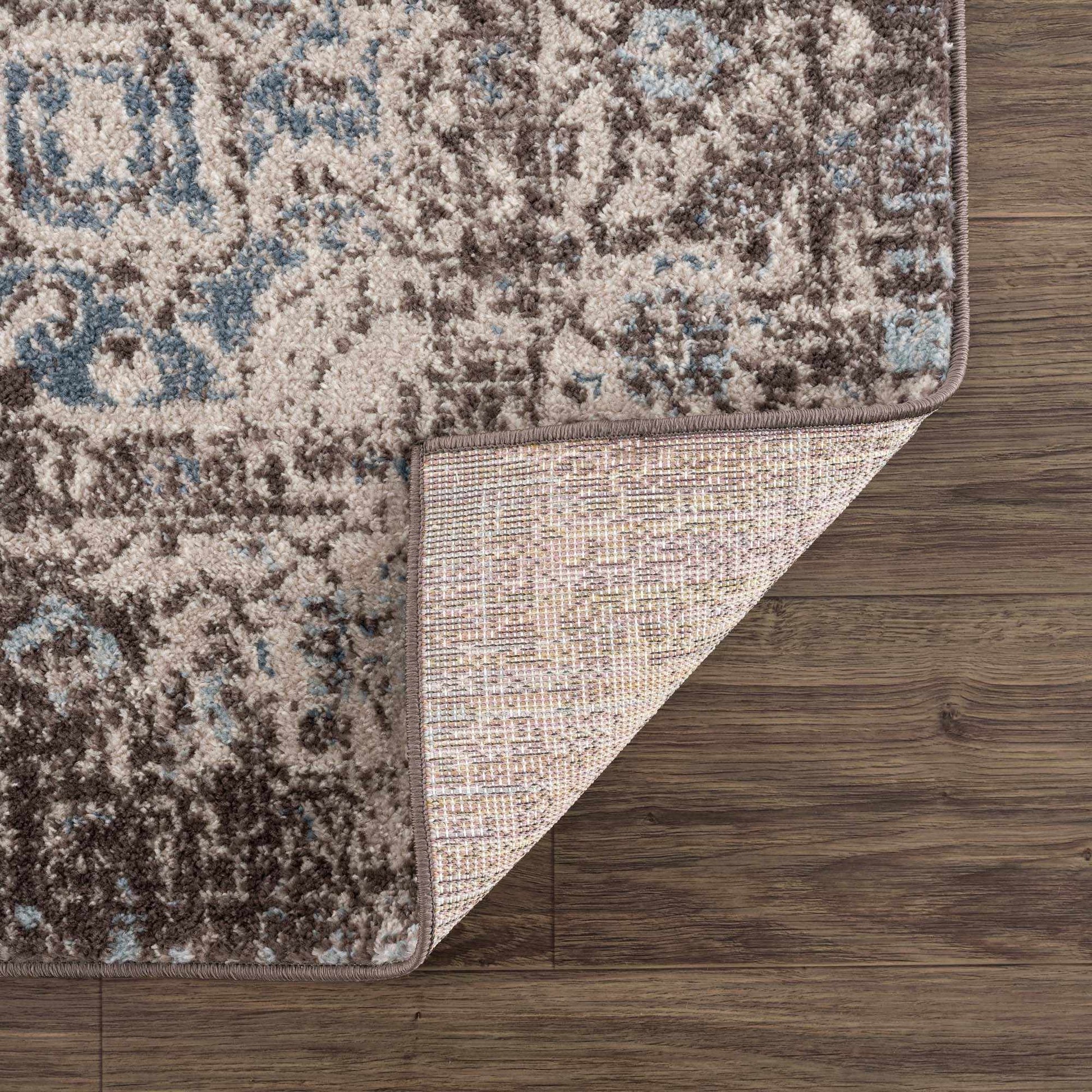 Peeta Dark Brown Medallion Area Rug from PriceLows™
