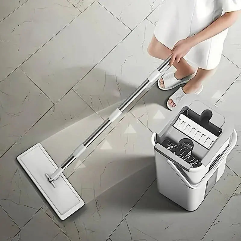 Hands-free flat floor mop + bucket set! 3 washable fibre mop pads for wet & dry use. 360-degree spin = less work for you from PriceLows™