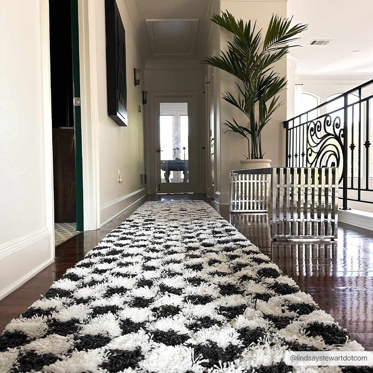 Atira Black & White Checkered Area Rug from PriceLows™