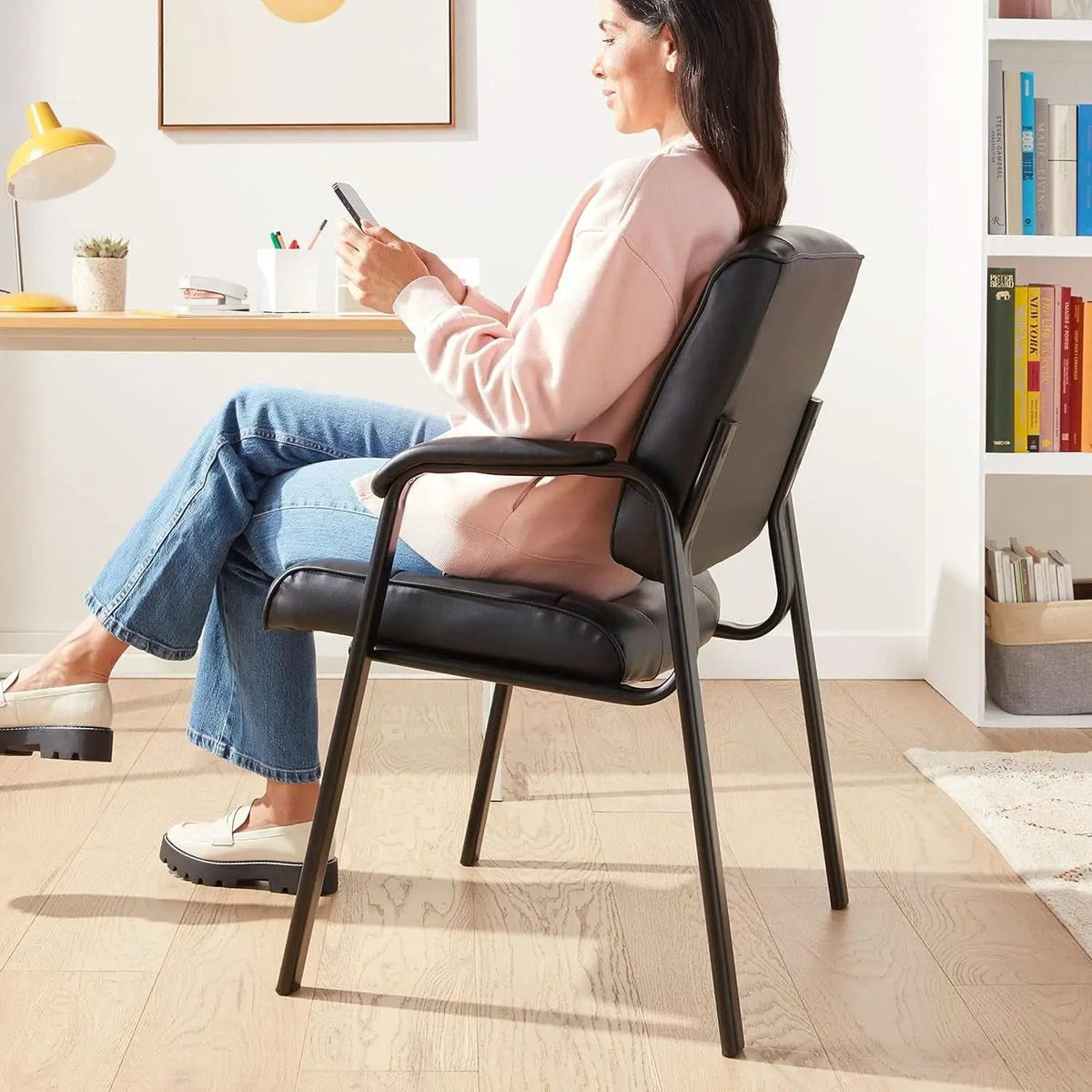 Black Faux Leather Office Guest Chair With Metal Frame from PriceLows™