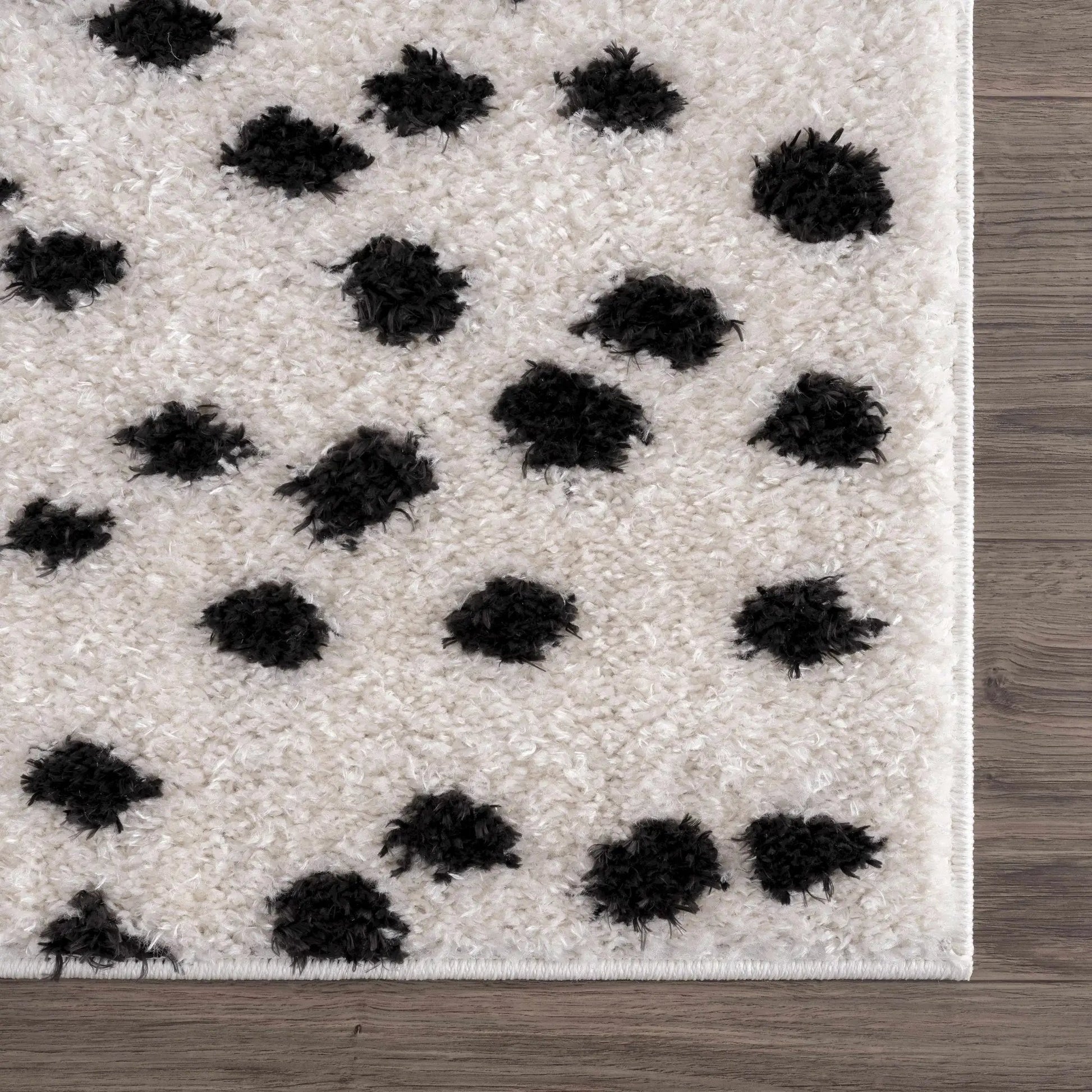 Cansu Black & White Dotted Area Rug from PriceLows™
