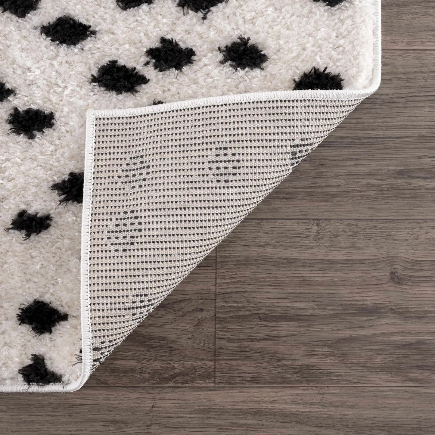 Cansu Black & White Dotted Area Rug from PriceLows™