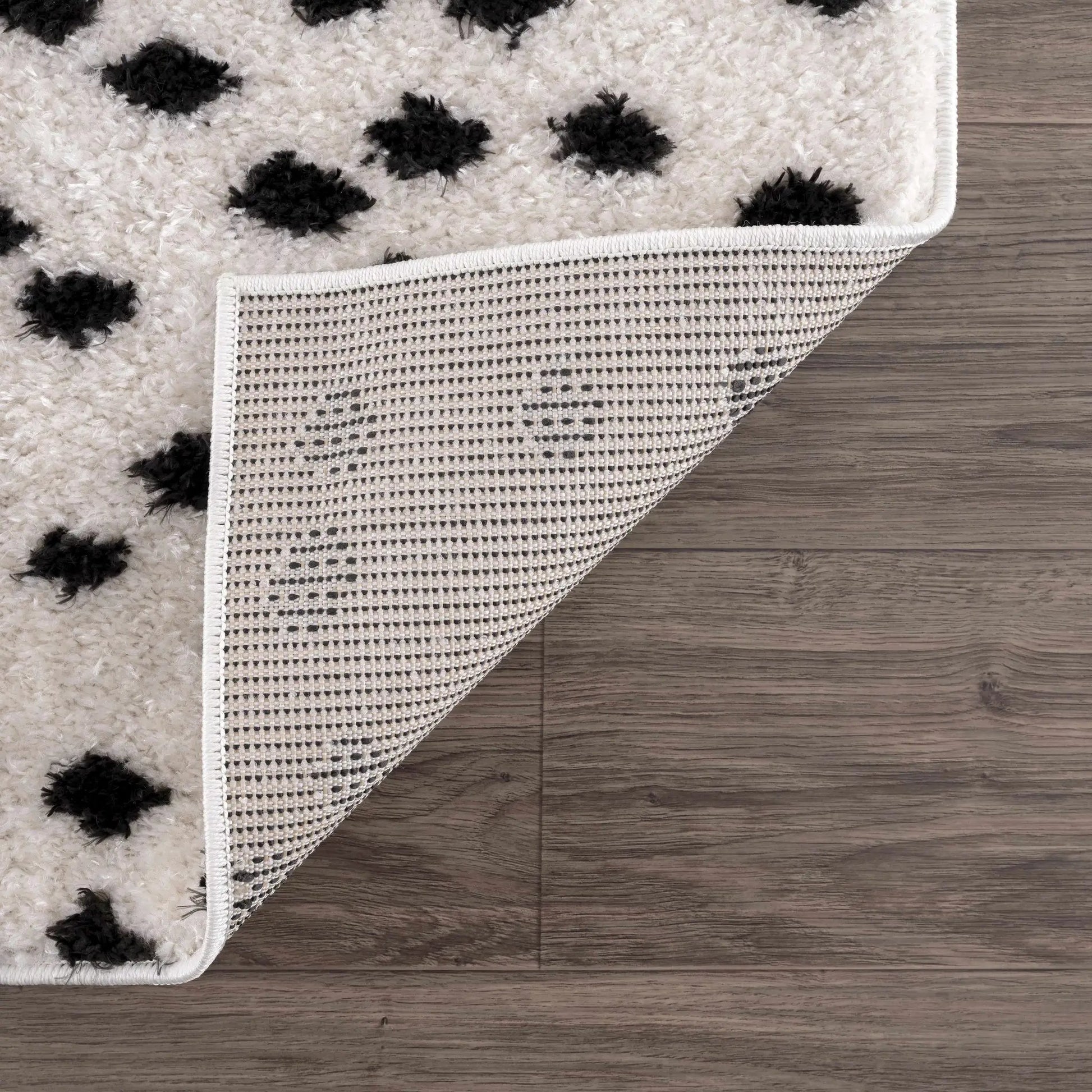 Cansu Black & White Dotted Area Rug from PriceLows™