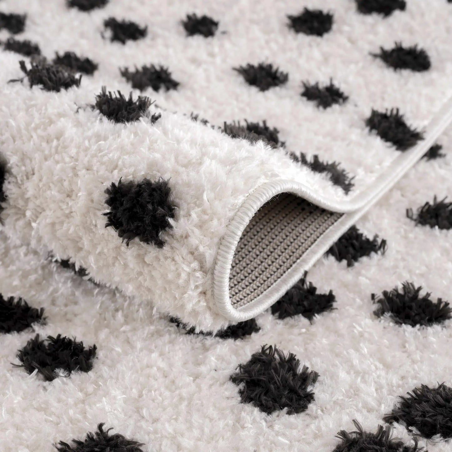 Cansu Black & White Dotted Area Rug from PriceLows™