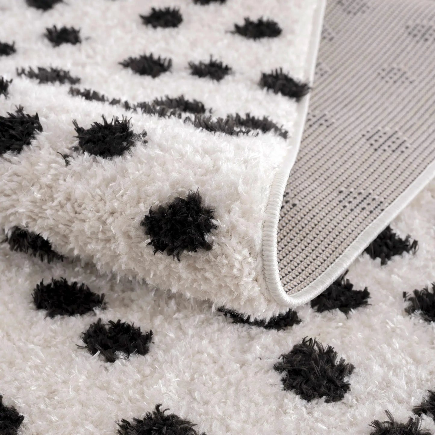 Cansu Black & White Dotted Area Rug from PriceLows™