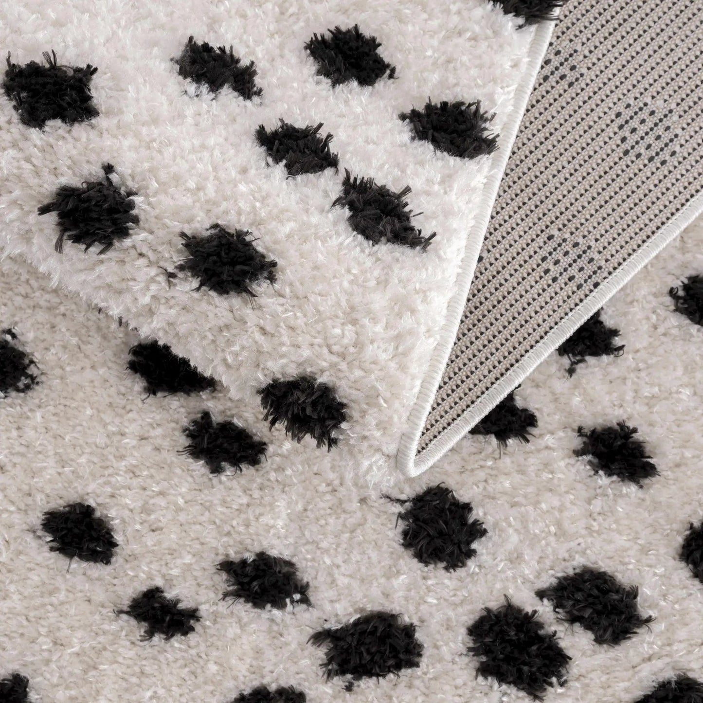 Cansu Black & White Dotted Area Rug from PriceLows™