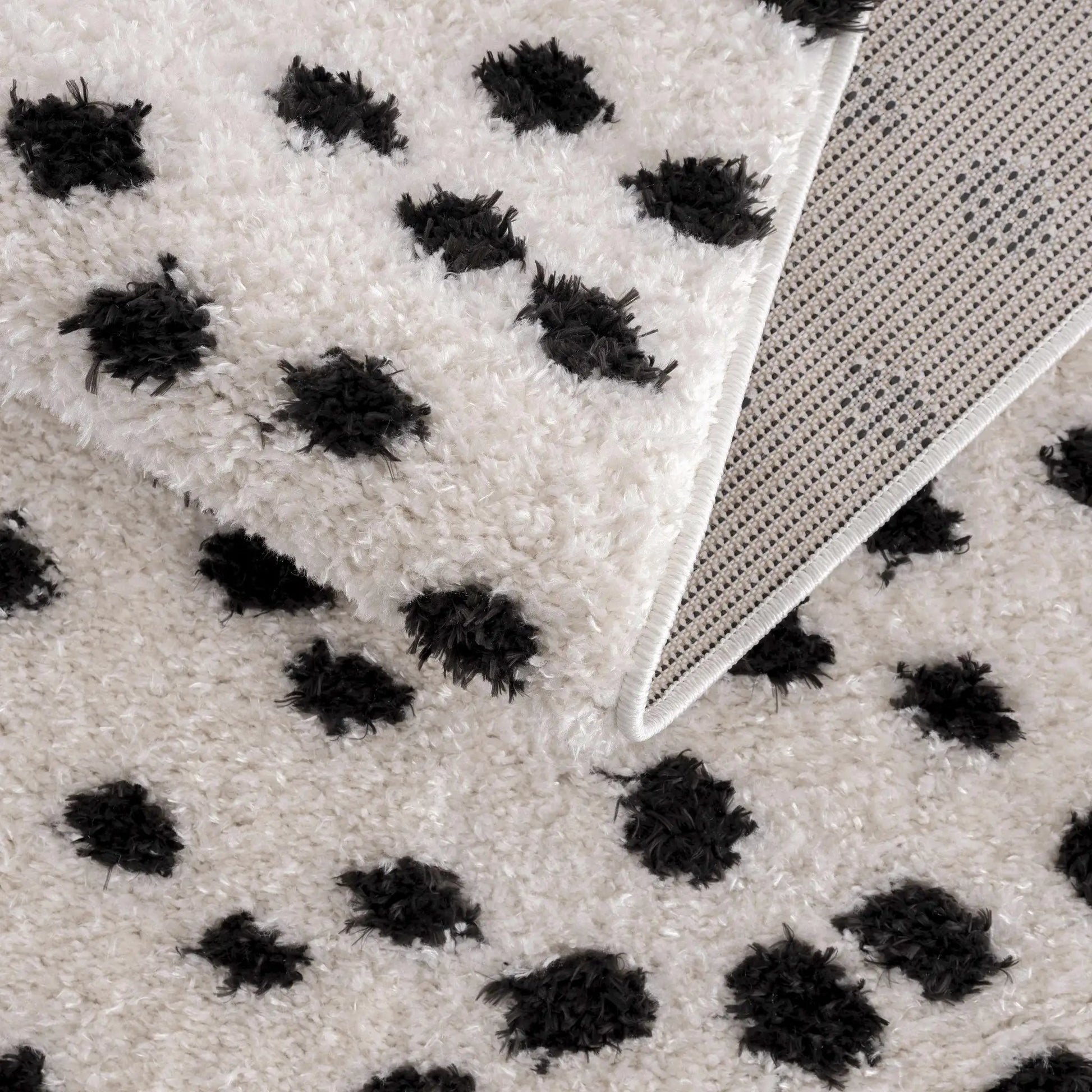 Cansu Black & White Dotted Area Rug from PriceLows™