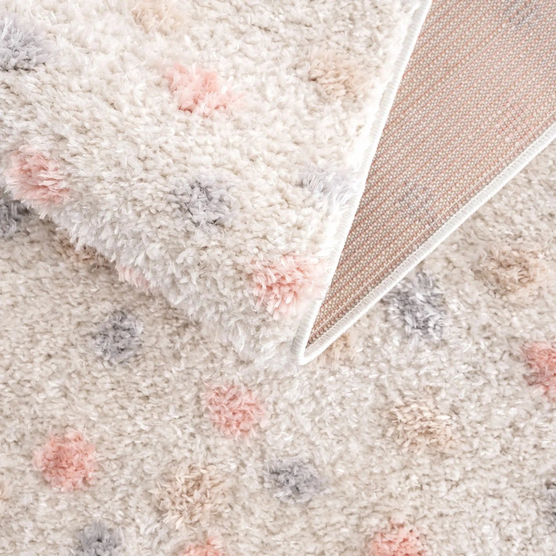 Cansu Pink & Cream Dotted Area Rug from PriceLows™