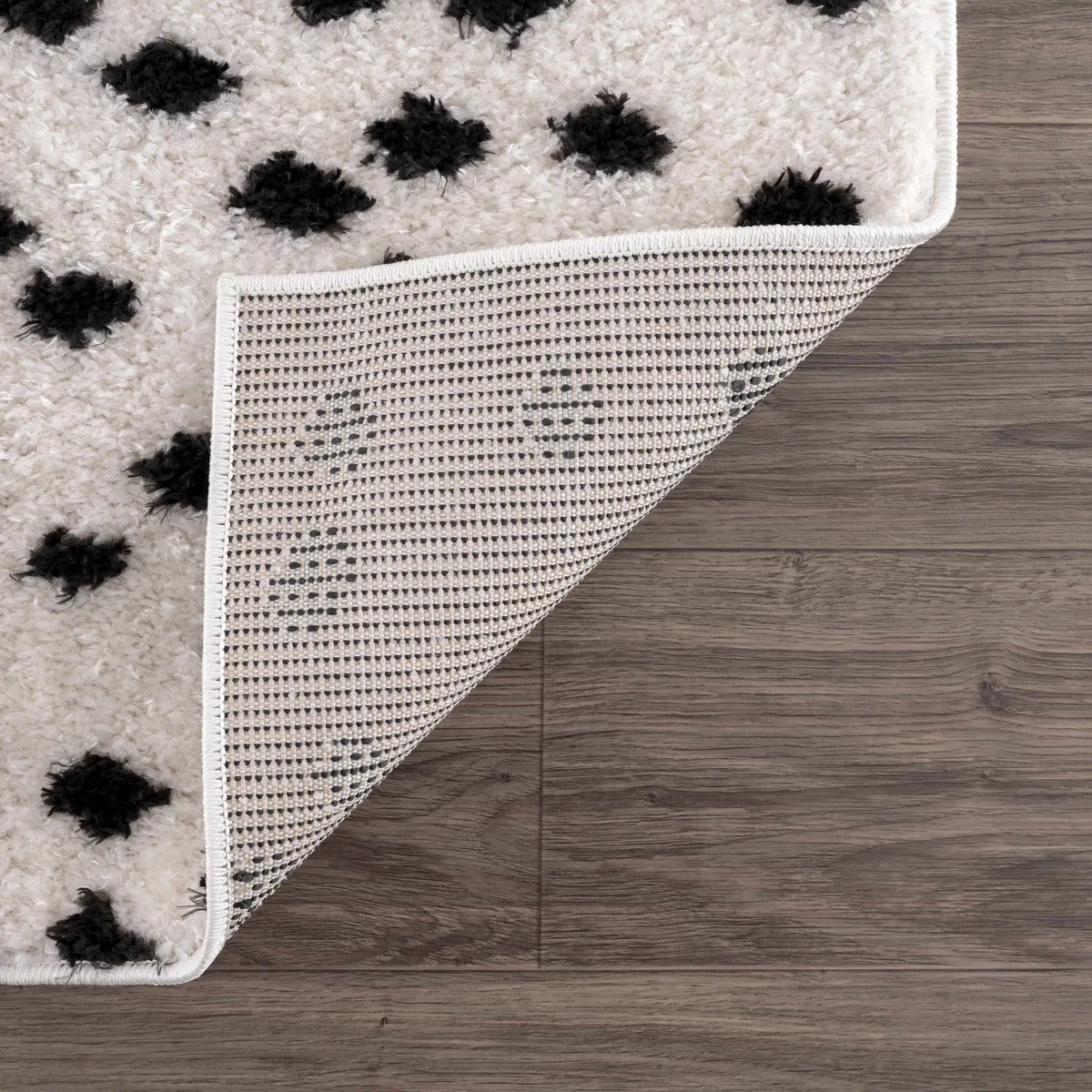 Cansu Black & White Dotted Area Rug from PriceLows™