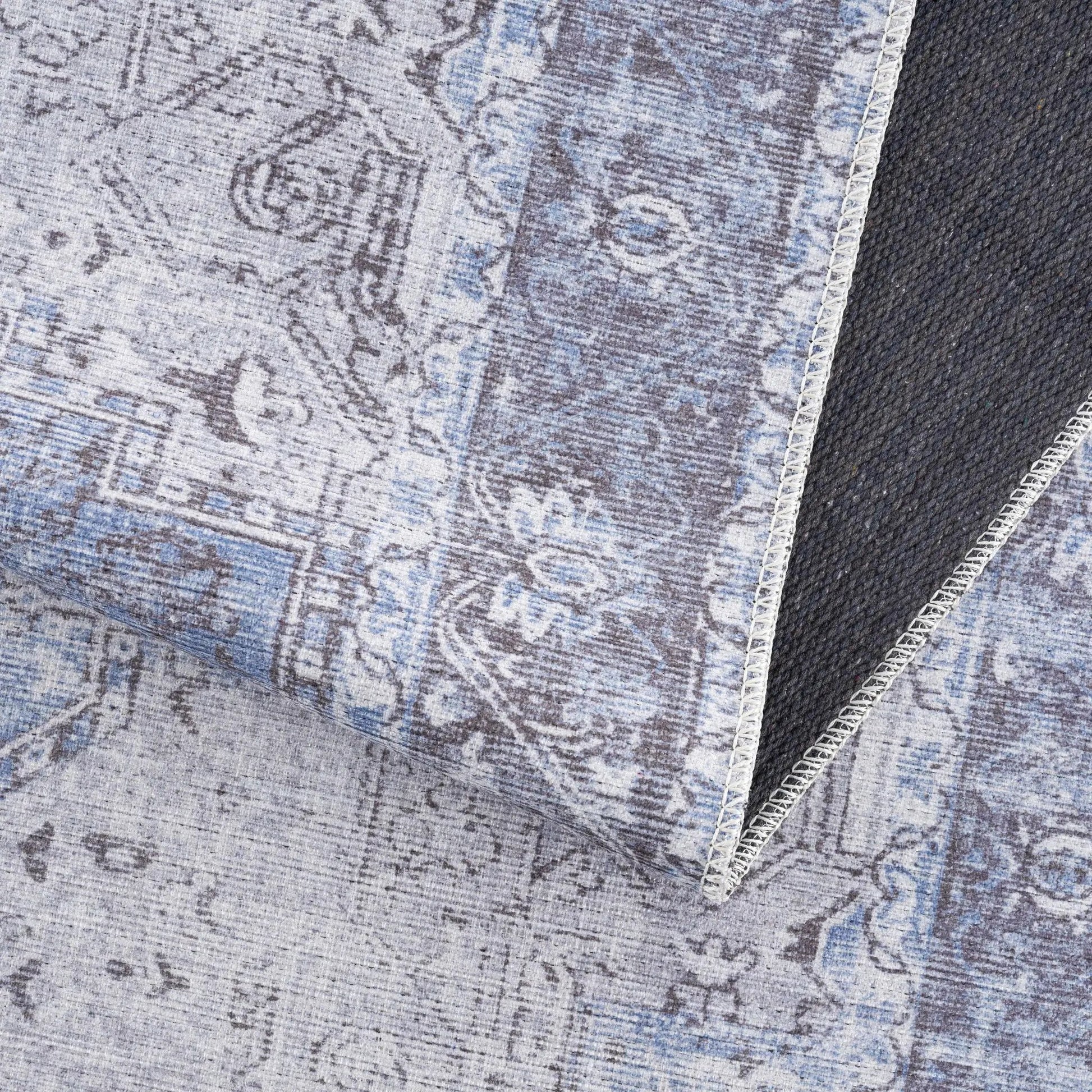 Rosman Blue Washable Area Rug from PriceLows™