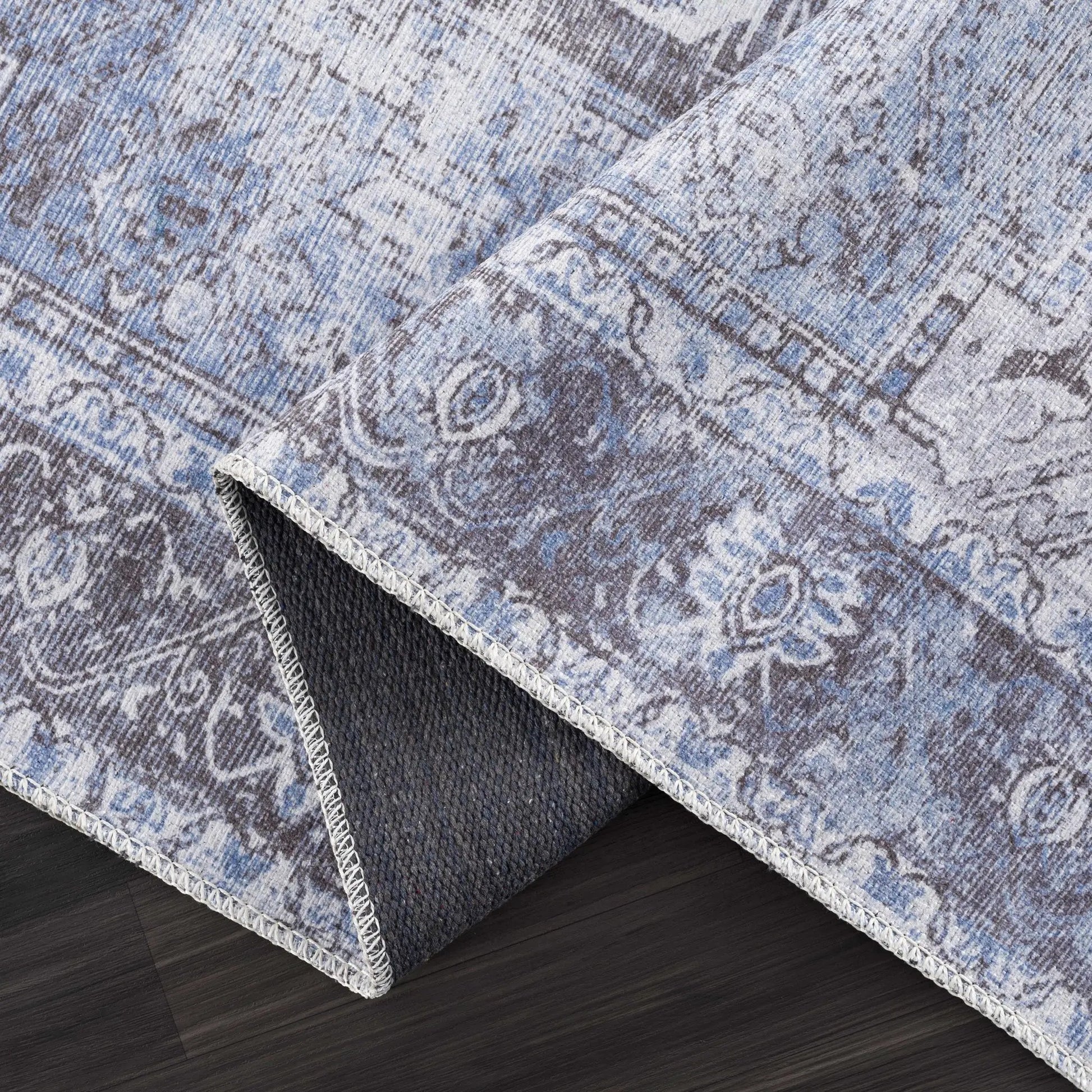 Rosman Blue Washable Area Rug from PriceLows™