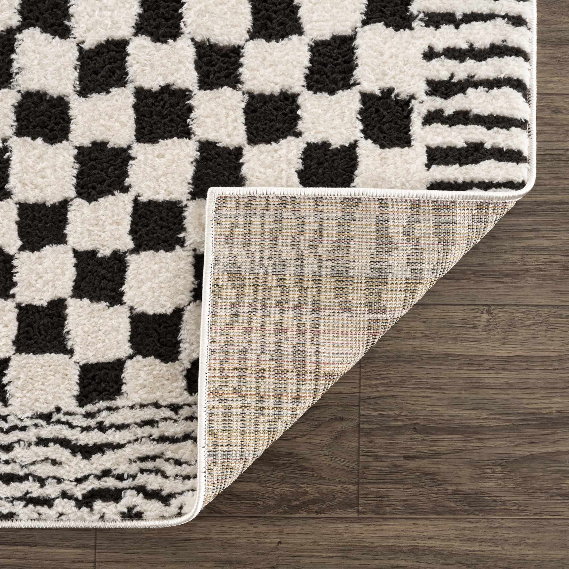Leryn Black & White Checkered Area Rug from PriceLows™