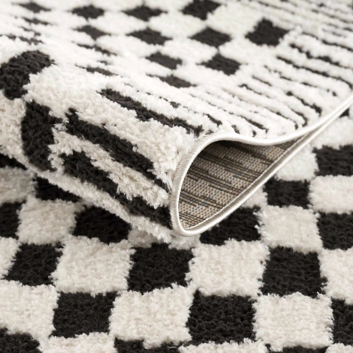 Leryn Black & White Checkered Area Rug from PriceLows™