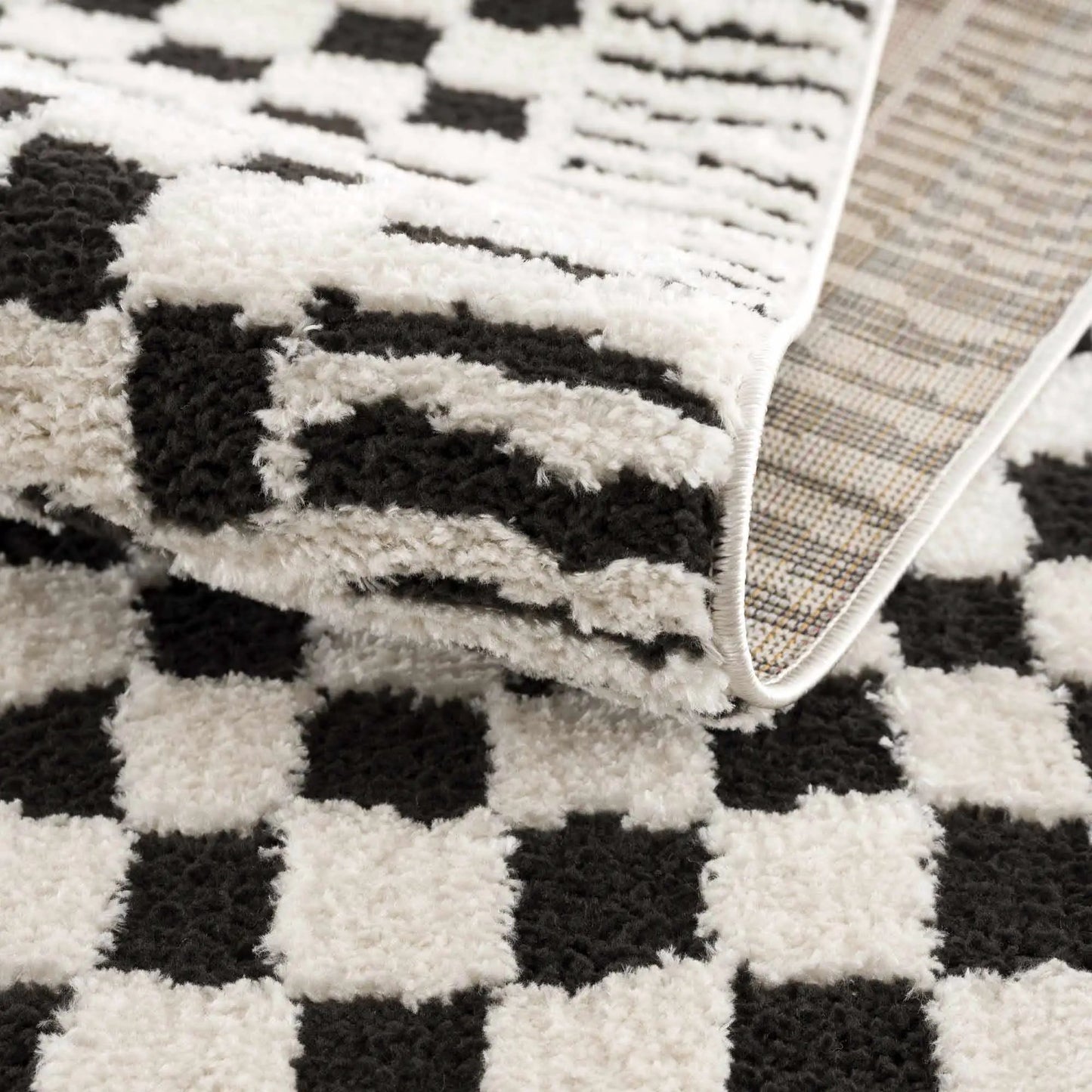 Leryn Black & White Checkered Area Rug from PriceLows™