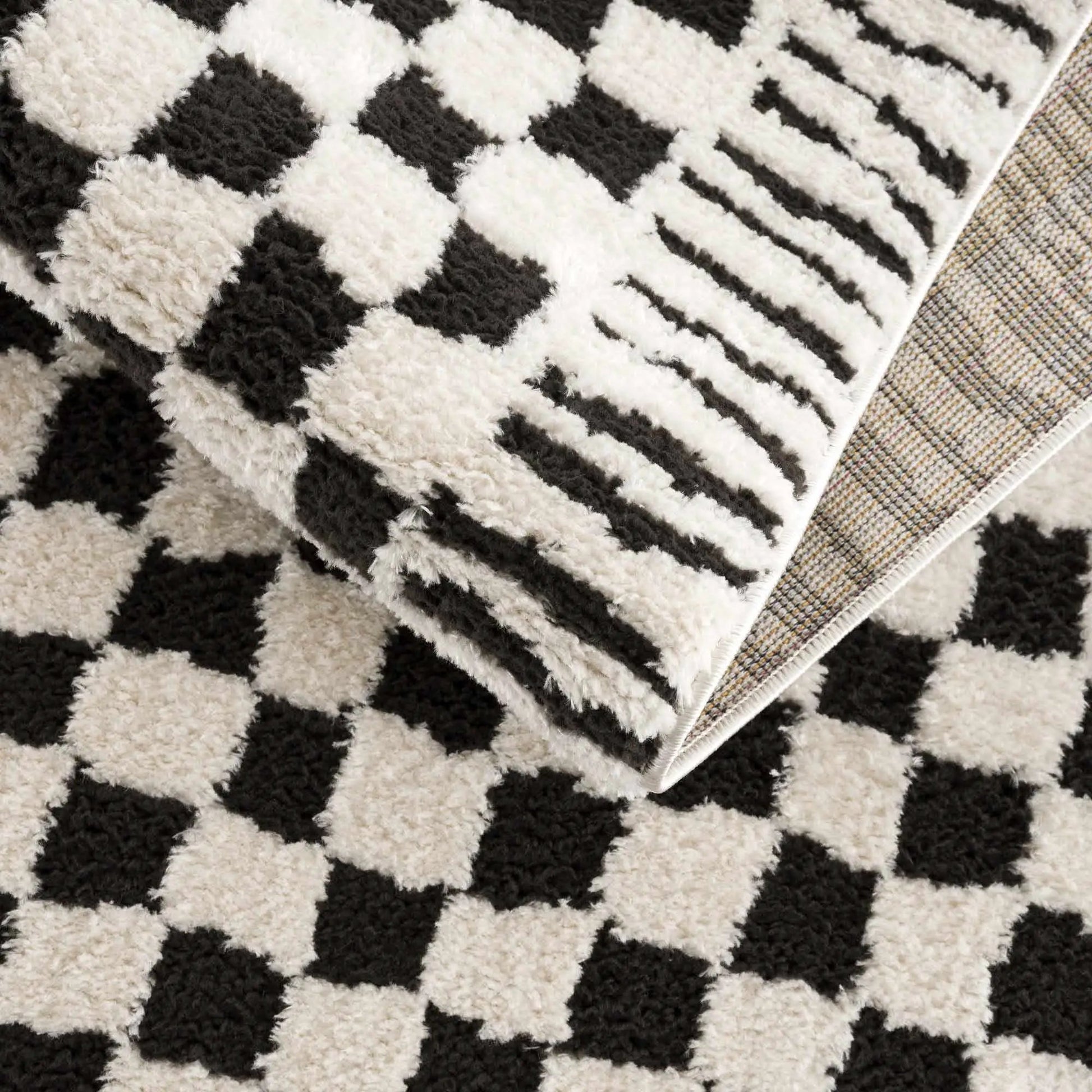 Leryn Black & White Checkered Area Rug from PriceLows™