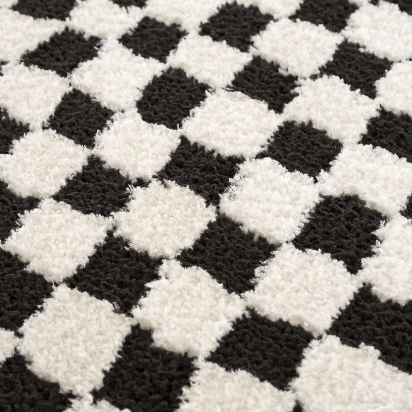 Leryn Black & White Checkered Area Rug from PriceLows™