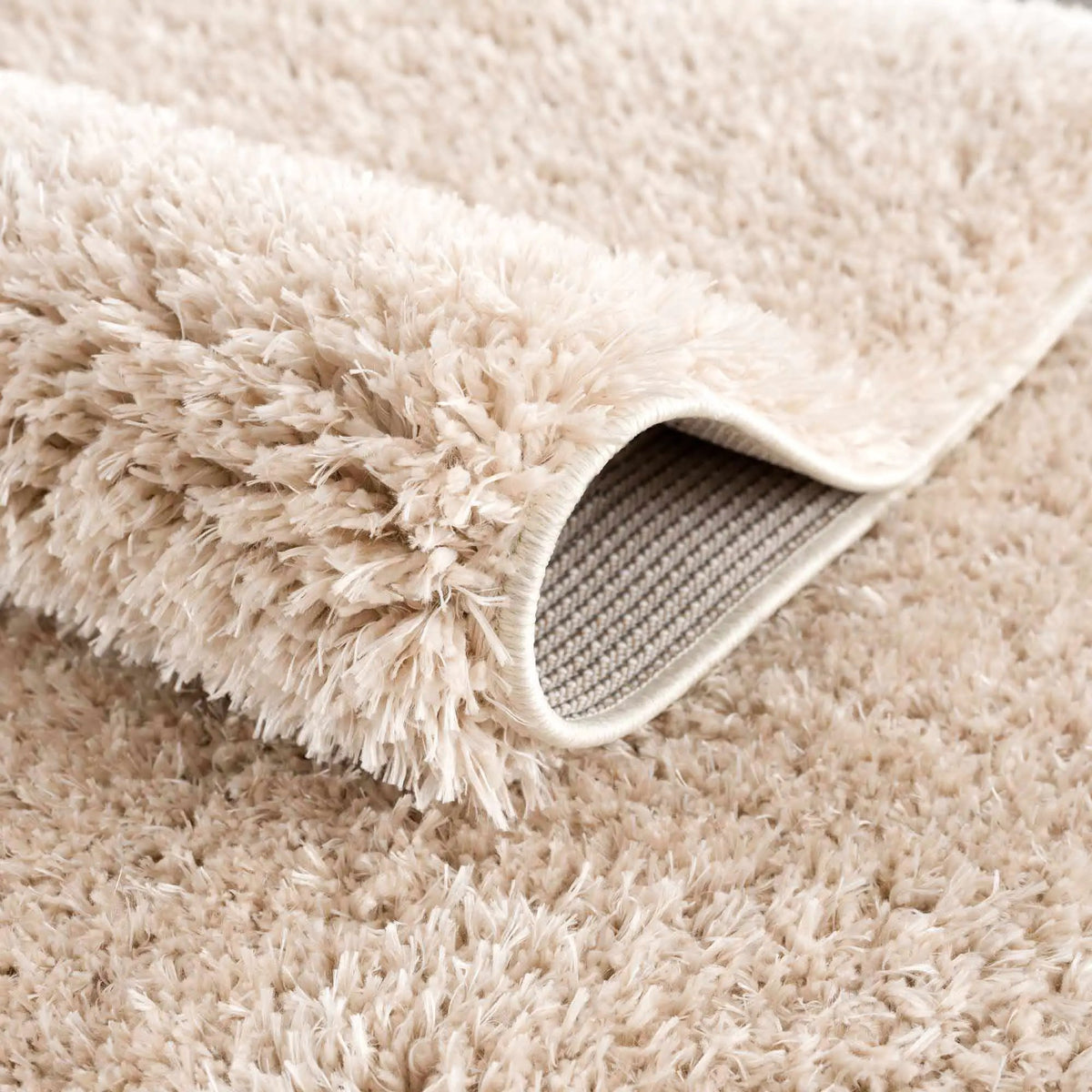 Faina Solid Beige Shag Rug Washable from PriceLows™
