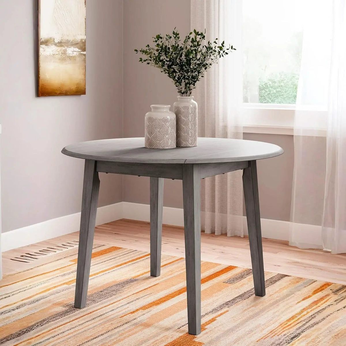 Gray Drop Leaf Dining Table Seats Four With Two Leaves from PriceLows™