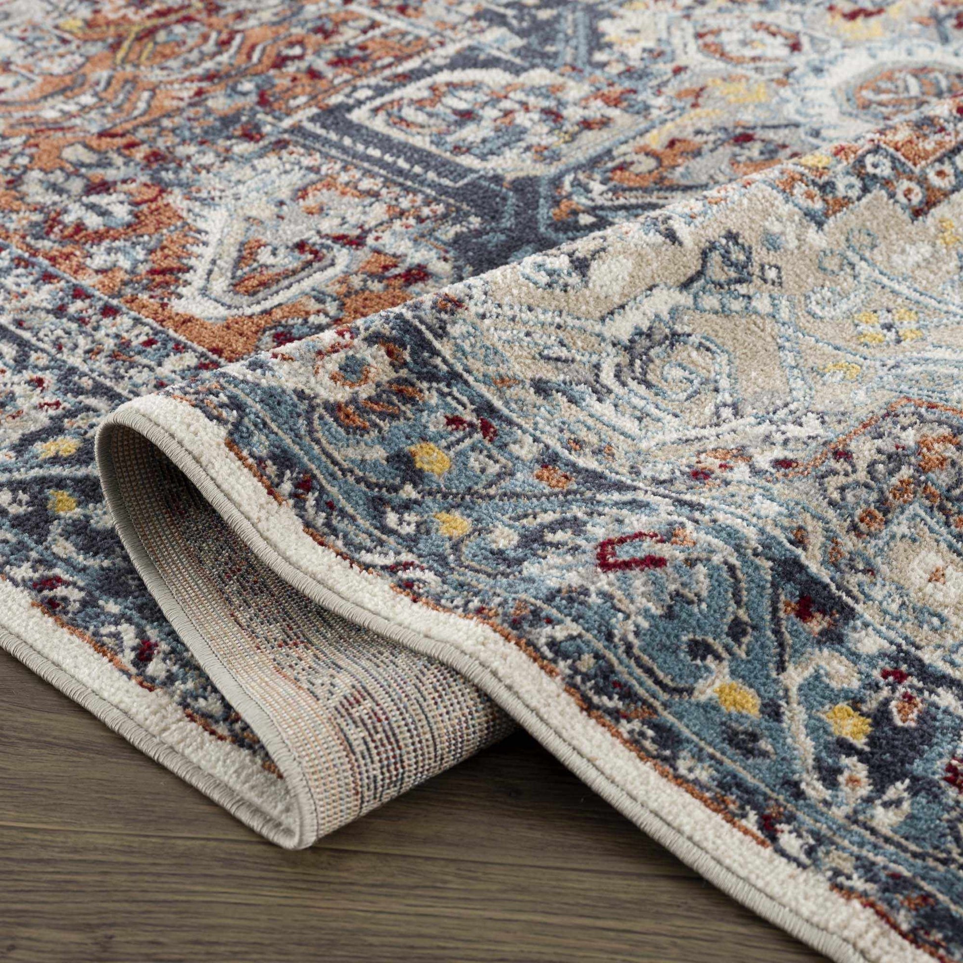 Cabacungan Blue & Rust Washable Area Rug from PriceLows™