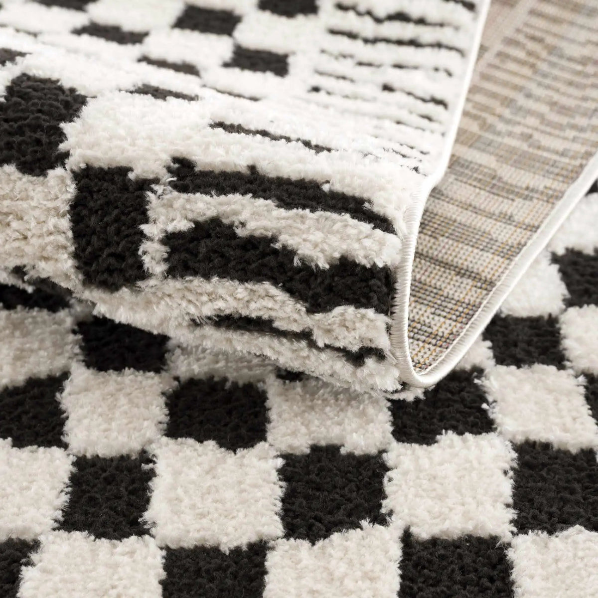 Leryn Black & White Checkered Area Rug from PriceLows™