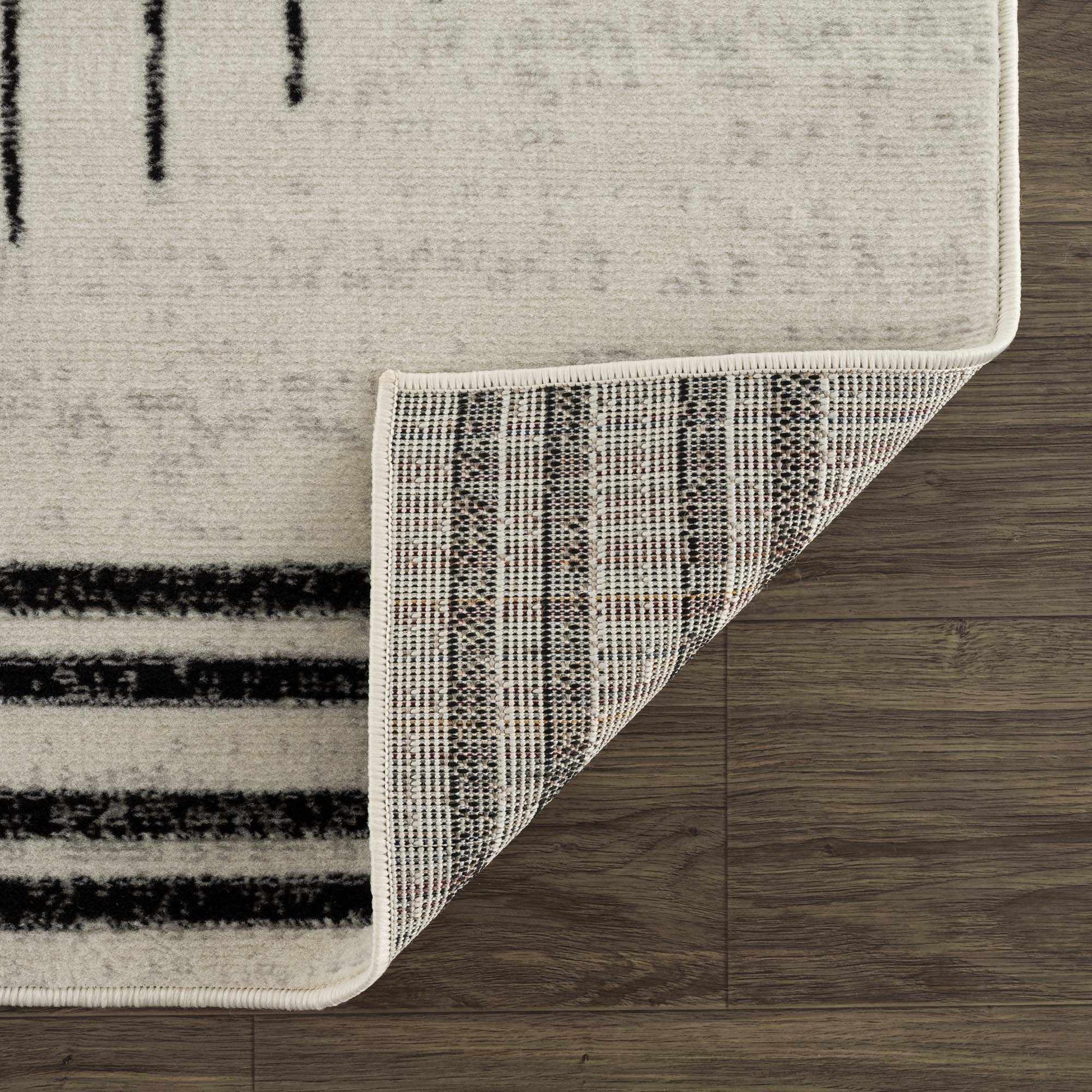 Angus Abstract Black and White Area Rug from PriceLows™