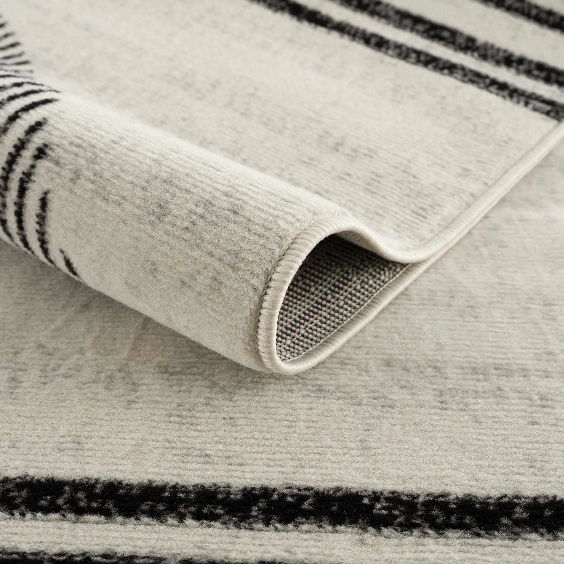 Angus Abstract Black and White Area Rug from PriceLows™