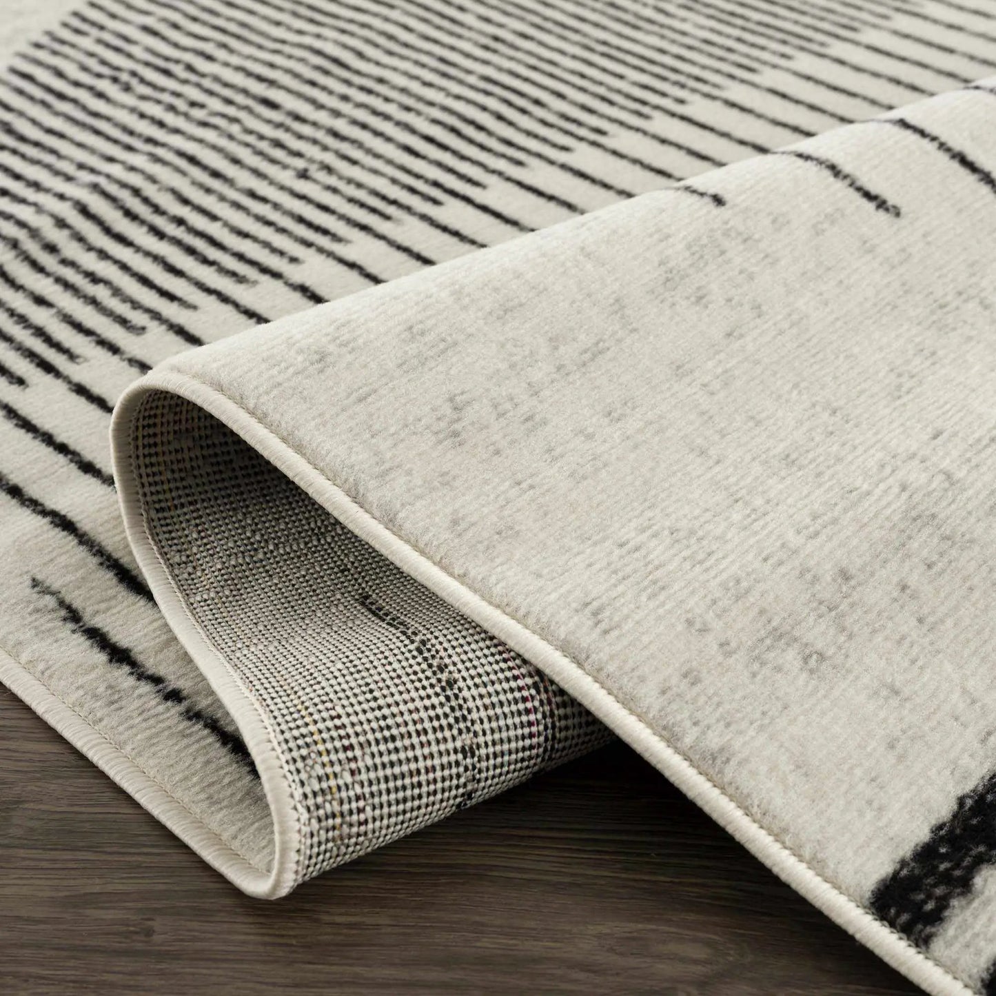 Angus Abstract Black and White Area Rug from PriceLows™