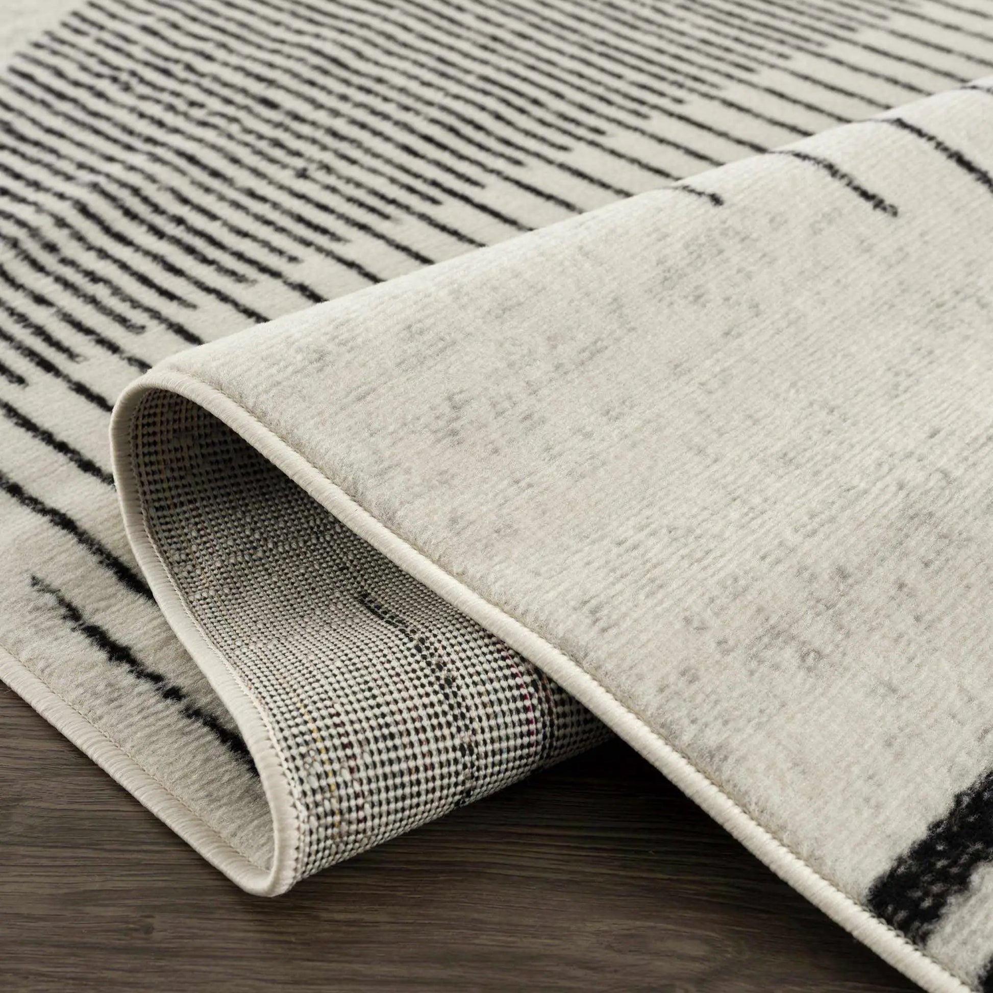 Angus Abstract Black and White Area Rug from PriceLows™