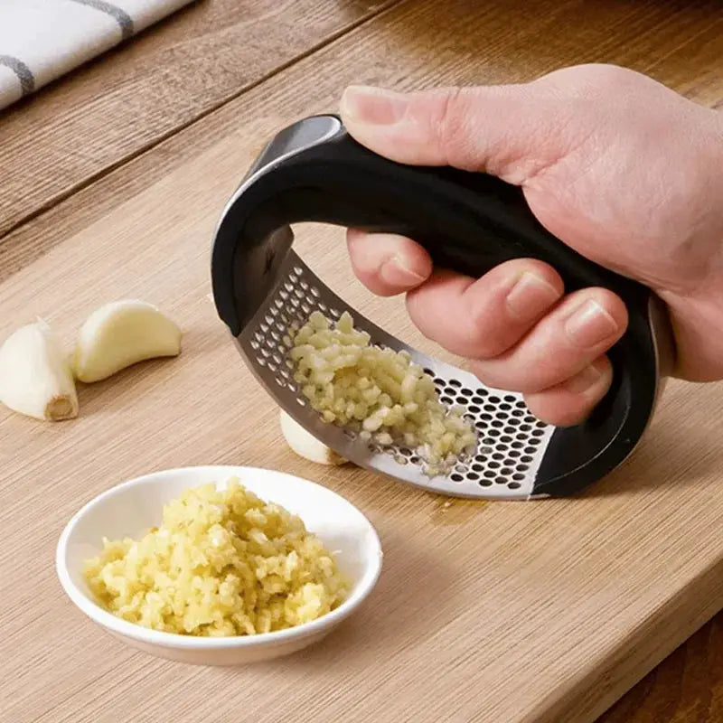 Garlic Press and Mincer, Heavy Duty Stainless Steel with Soft Handle, Effortless Garlic Crusher for Minced Garlic and Paste from PriceLows™