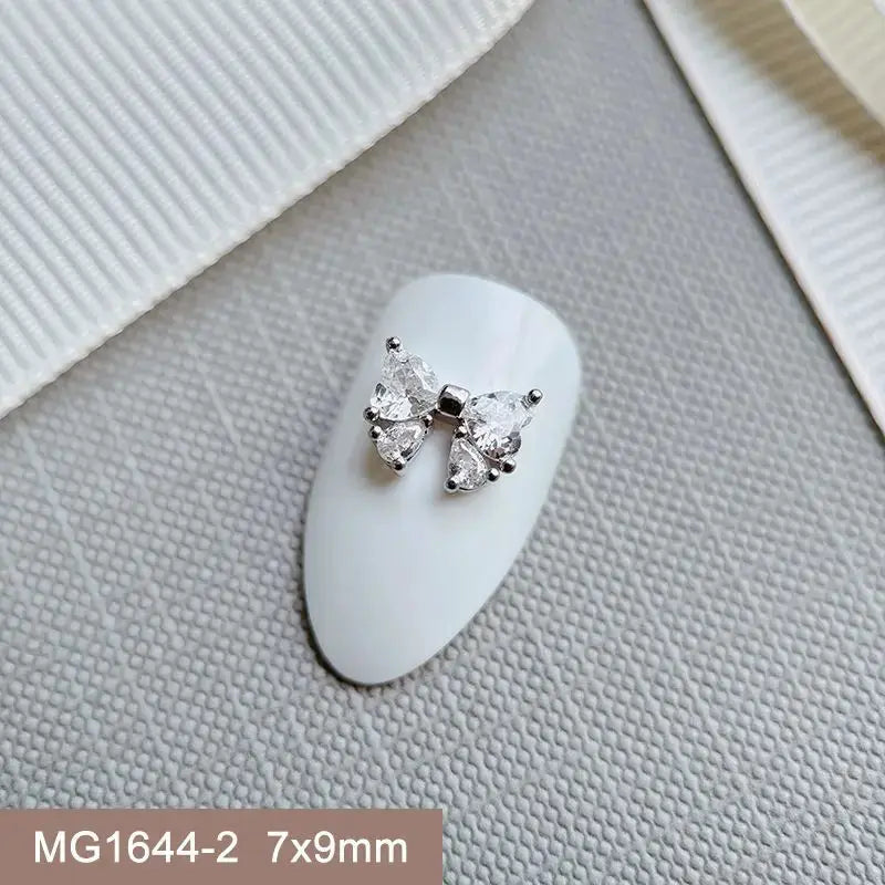 10pcs Silver Rhombus Streamer Bowknot Tassel Zircon Nails Jewelry Decorations DIY Wear Nail Art Accessories Charms Part Supplies from PriceLows™