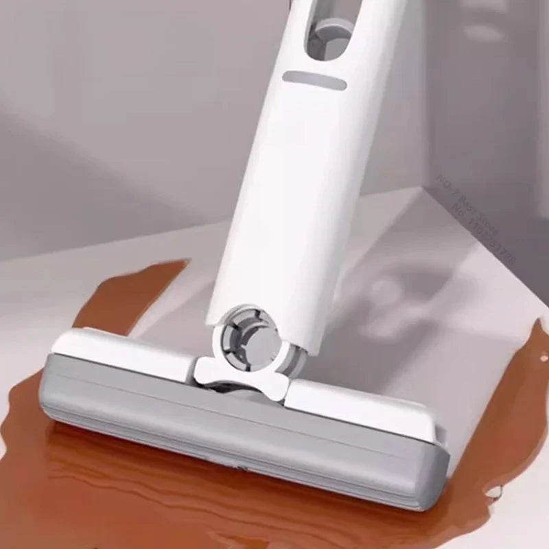 Mini squeezable mop with powerful folding design. Household cleaning tool. No hand washing required. Strong water absorption. from PriceLows™
