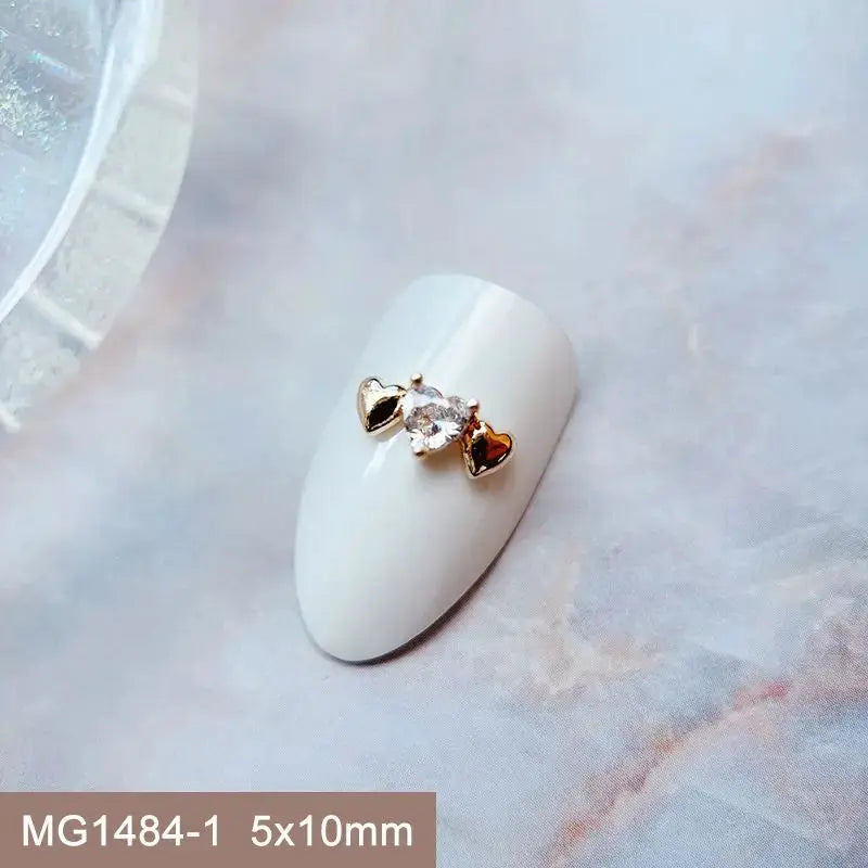 10pcs Valentine's Day Pink Love Heart Ribbon Zircon Metal Nails Jewelry Decorations Nail Art Accessories Charms Parts Supplies from PriceLows™