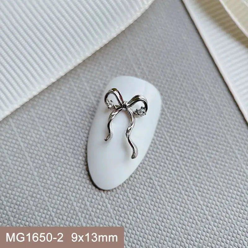 10pcs Silver Rhombus Streamer Bowknot Tassel Zircon Nails Jewelry Decorations DIY Wear Nail Art Accessories Charms Part Supplies from PriceLows™