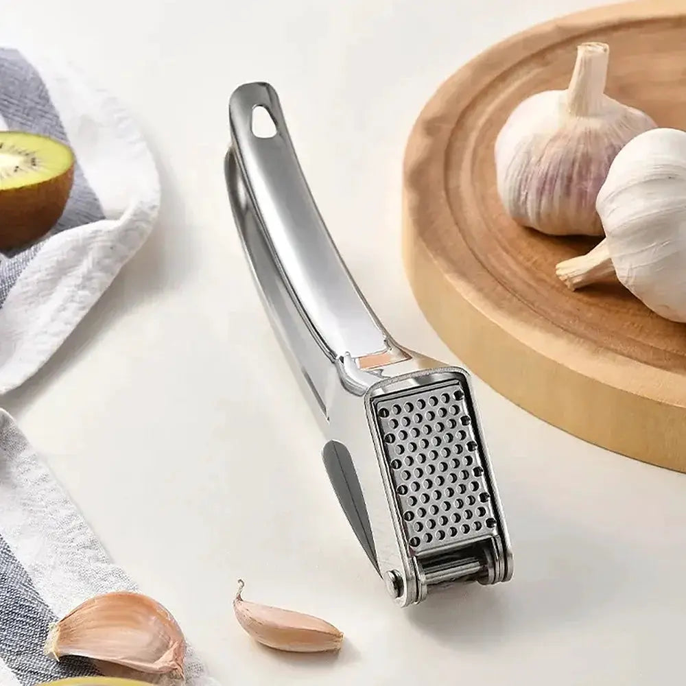 Stainless Steel Garlic Press Ginger Juicer Heavy-Duty Manual Mincer Garlic Crusher for Soups Salads Dips Easy-Clean Kitchen Tool from PriceLows™