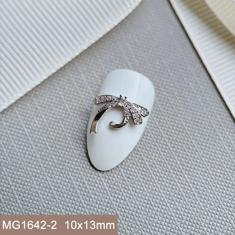 10pcs Silver Rhombus Streamer Bowknot Tassel Zircon Nails Jewelry Decorations DIY Wear Nail Art Accessories Charms Part Supplies from PriceLows™