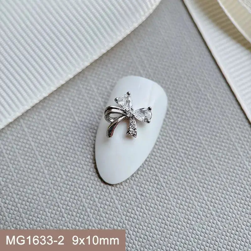 10pcs Silver Rhombus Streamer Bowknot Tassel Zircon Nails Jewelry Decorations DIY Wear Nail Art Accessories Charms Part Supplies from PriceLows™