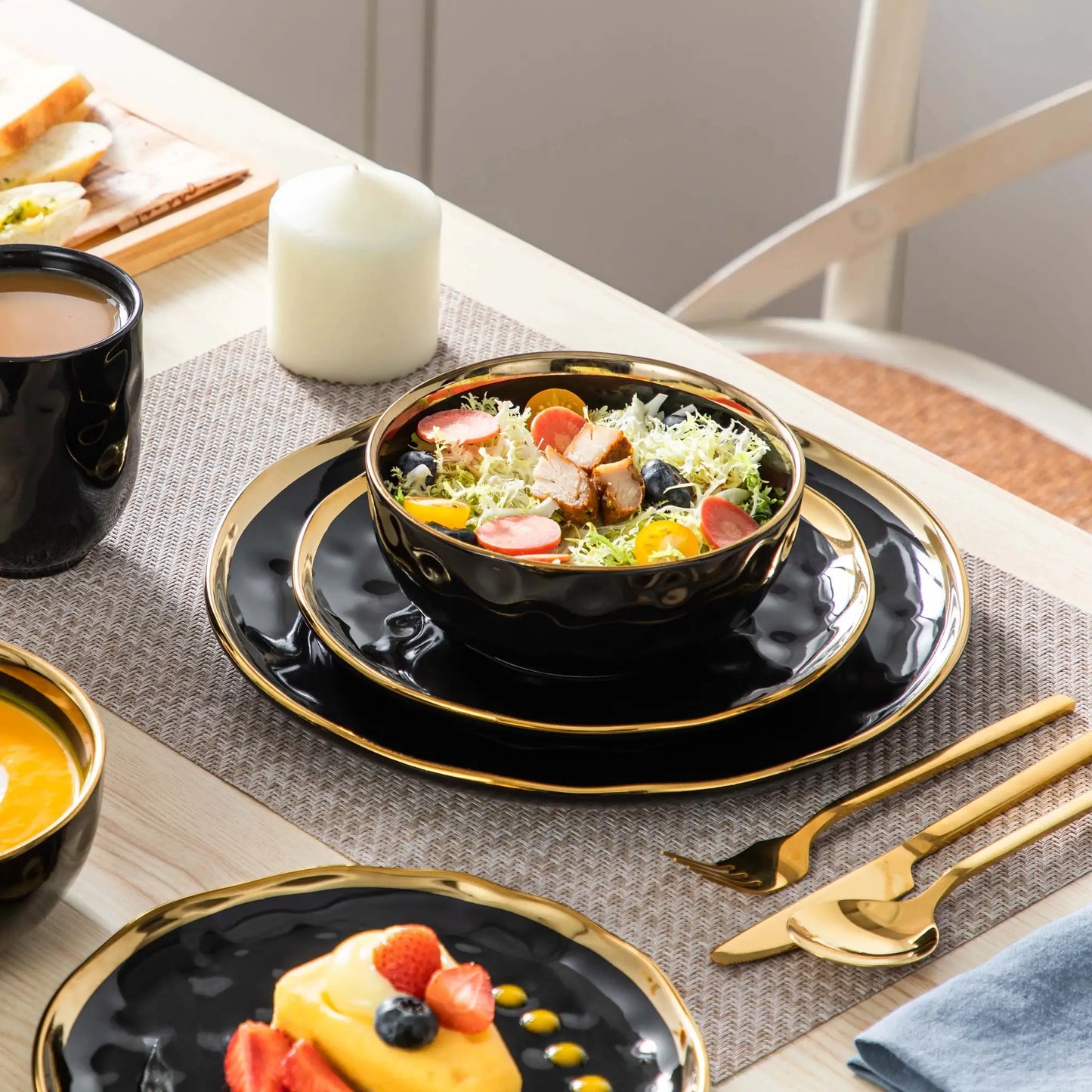 LOVECASA 16/32 Piece Black Porcelain Dinnerware Set with Gold Trim Dessert Plate,Dinner Plate,Cup,Bowl Tableware Set from PriceLows™