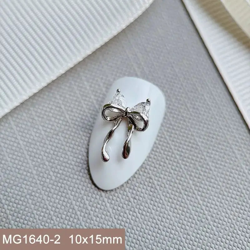 10pcs Silver Rhombus Streamer Bowknot Tassel Zircon Nails Jewelry Decorations DIY Wear Nail Art Accessories Charms Part Supplies from PriceLows™