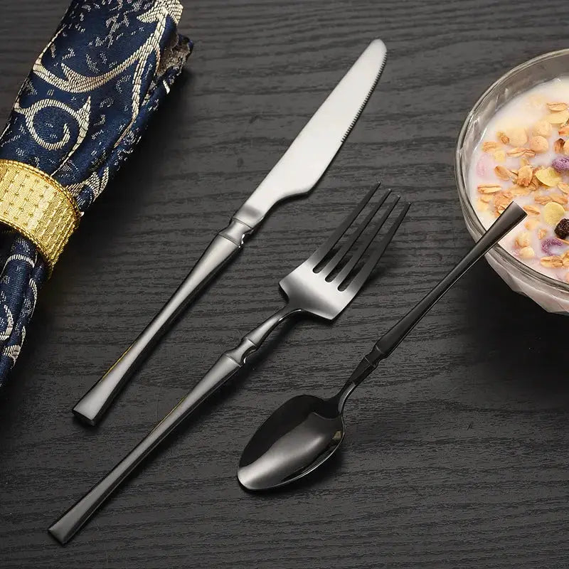 40/60-piece black stainless steel cutlery set, mirror polished, including dinner forks, steak knives, and soup spoons, suitable from PriceLows™