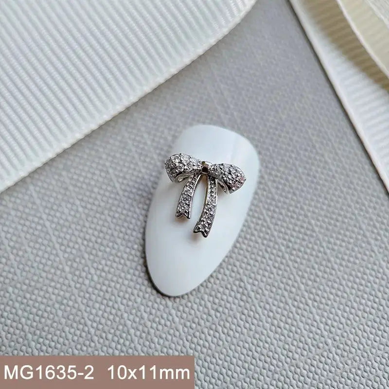 10pcs Silver Rhombus Streamer Bowknot Tassel Zircon Nails Jewelry Decorations DIY Wear Nail Art Accessories Charms Part Supplies from PriceLows™