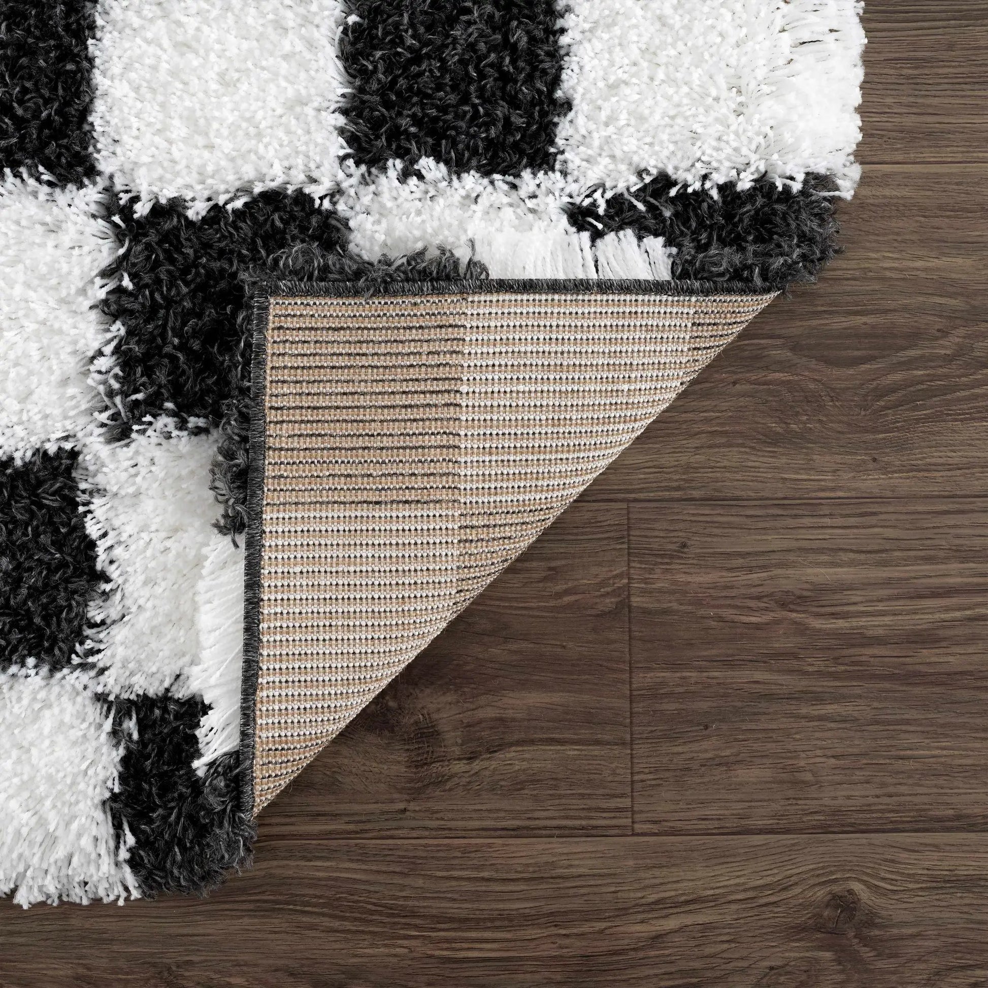Atira Black & White Checkered Area Rug from PriceLows™